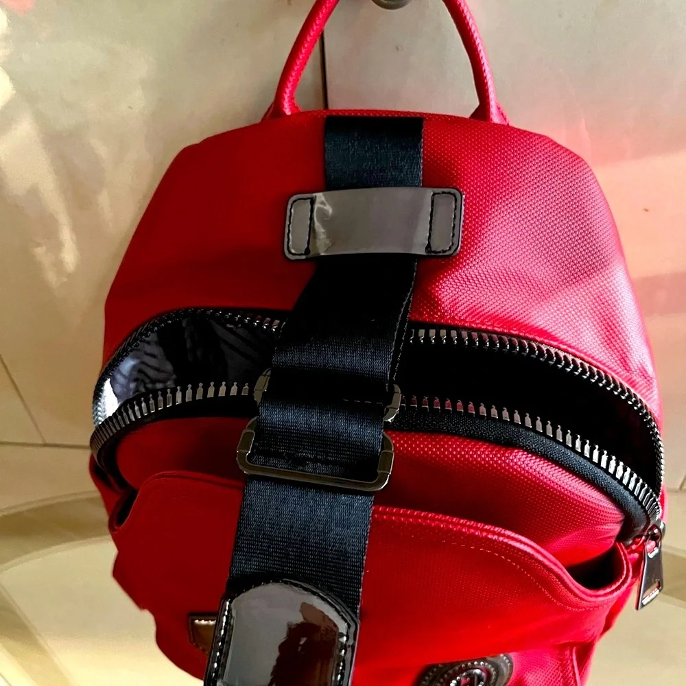 ARMISE GOLD elegant design red and black backpack.